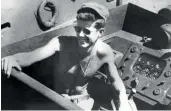  ??  ?? Former US President and then-US Navy Lt. John F. Kennedy is seen aboard the Patrol Torpedo boat PT-109 boat during World War II in the Pacific theatre in this handout photograph taken on March 4, 1942.
