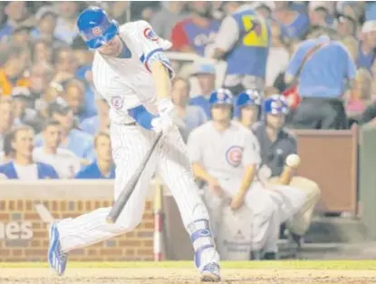  ?? | AP ?? The Cubs’ Kris Bryant launches a home run against the Sox’ Anthony Ranaudo in the sixth inning. It was the Cubs’ first hit.