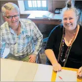  ?? PICTURE / / HERITAGE NZ ?? NZ Heritage Endowment Fund trustee David Nicoll and Kerikeri Mission Station manager Liz Bigwood with the recovered ledger pages, stolen from the Stone Store in the 1960s. The store’s ledgers reveal some fascinatin­g details of early ‘fair trade’ in Kerikeri.