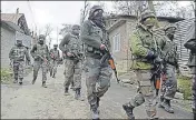  ?? AFP FILE ?? Soldiers conducting a search operation near Srinagar.