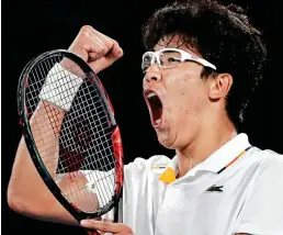  ?? AP ?? Specs appeal: Hyeon Chung enjoys his landmark victory