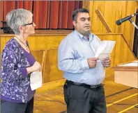  ?? SUBMITTED PHOTO ?? Anne McDermid, volunteer, stands beside Ahmad Alsso from Syria as he gives his thank-you speech at an event organized by Lifeline Syria.