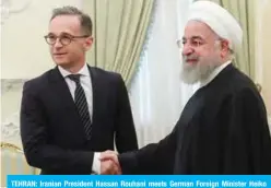  ?? — AFP ?? TEHRAN: Iranian President Hassan Rouhani meets German Foreign Minister Heiko Maas yesterday.