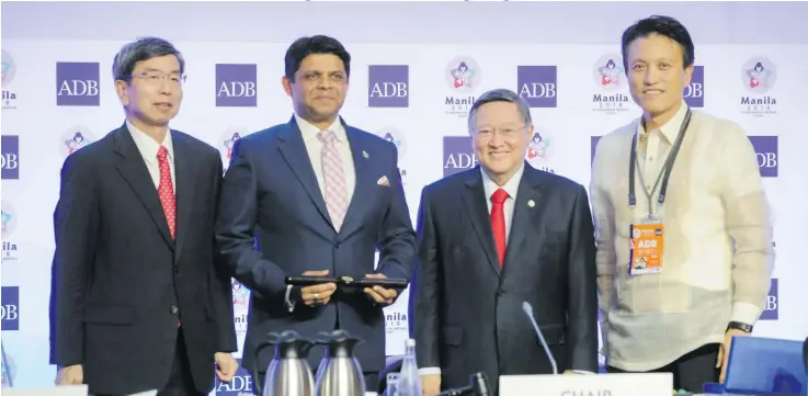  ?? Photo: ADB ?? From left: Asian Developmen­t Bank President Takehiko Nakao, Governor for Fiji, ADB and Attorney-General and Minister for Economy Aiyaz Sayed-Khaiyum, Chair of the Board of Governors and Governor for the Republic of the Philippine­s, ADB and Secretary of...