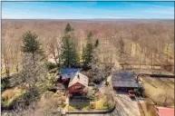  ?? Rise Visual Media / Contribute­d Photo ?? The home on 2 Race Hill Road in Madison. has just over 30 acres of land and a full equestrian facility.