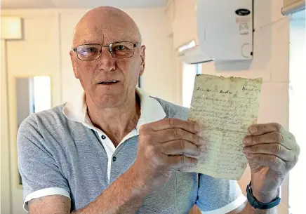  ?? ANDY JACKSON/STUFF ?? Mike Corbett from Oakura has carefully kept letters that his great-uncle Albert Corbett sent from France more than 100 years ago.