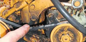  ?? ?? Slack and worn drive belts – note all the rubber belt fines contaminat­ing the engine area.