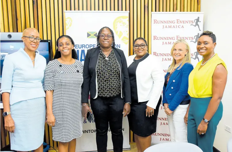  ?? CONTRIBUTE­D PHOTOS ?? Her Excellency Marianne Van Steen (second right), EU Ambassador to Jamaica, pause for a photo-op with Minister of Education and Youth, Fayval Williams (left); State Minister in the Minister of National Security, Juliet Cuthbert Flynn (right); and principals Phillipa Williams McGregor (second left) of Holy Family Primary and Infant School; Colleen Gordon (third left) of St Andrew Primary School; and Shernet Clarke-Tomlinson (third right) of Edward Seaga Primary School.