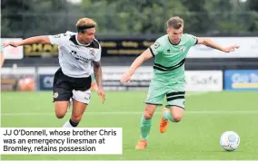  ??  ?? JJ O’Donnell, whose brother Chris was an emergency linesman at Bromley, retains possession