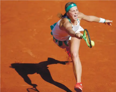  ?? AP FOTO ?? YOUNG AND RESTLESS. Jelena Ostapenko beats 30th seed Timea Bacsinszky of Switzerlan­d to be the first Latvian to advance to the finals of a Grand Slam.