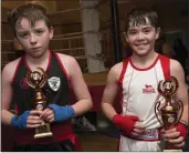  ??  ?? Josh O’Reilly from St. Josephs with bout winner Brian Gilroy from Ballymore Hollywood.