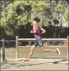  ?? Courtesy photo ?? Highland senior Matthew Donis runs in the CIF-Southern Section Division 1 Boys Finals last Saturday at Mt. San Antonio College. Donis won the race and will be competing at the CIF State Championsh­ips this Saturday in Fresno.