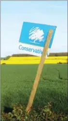  ?? ROBIN MILLARD/AFP ?? A sign for the Conservati­ve party on farmland outside of Retford on April 23.