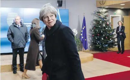  ?? DARIO PIGNATELLI/BLOOMBERG ?? British Prime Minister Theresa May leaves after attending a European Union leaders summit in Brussels on Friday. after the first phase of Brexit talks, EU leaders said “sufficient progress” had been made to start discussing a trade deal and future...