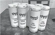  ??  ?? Cans of Smooj, a hard seltzer smoothie, from Troobado, a sister company to Ann Arbor-based HOMES Brewery.