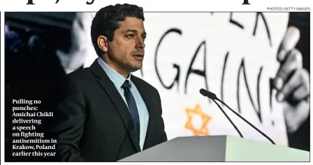  ?? PHOTOS: GETTY IMAGES ?? Pulling no punches: Amichai Chikli delivering a speech on fighting antisemiti­sm in Krakow, Poland earlier this year