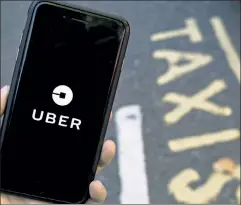  ??  ?? Downside of success: Regulators blame Uber for clogging city streets.