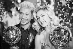  ??  ?? Fisher and Arnold, winners of ‘Dancing With the Stars’ Season 25. — Courtesy of ABC