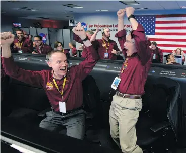  ?? — NASA ?? Kris Bruvold, left, and Sandy Krasner at NASA yesterday after InSight landed on Mars.