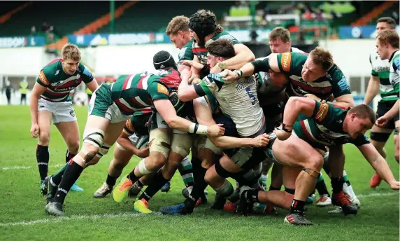  ??  ?? ‘IT IS HARD TO STOP IF YOU GET IT SET UP’: Leicester Tigers forwards drive over the line as Charlie Clare scores their second try during the Gallagher Premiershi­p victory over Newcastle Falcons at Welford Road on Sunday. Tigers captain Tom Youngs has praised the hard work of the forward pack