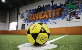  ??  ?? Zweatit offer soccer classes for youths, adult leagues and open playing time at its indoor soccer field in the 200 block of West Cevallos in Southtown.