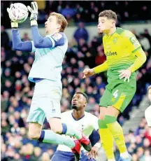  ?? AP ?? Norwich City’s goalkeeper Tim Krul saves a shot during the English FA Cup fifth-round match against Tottenham Hotspur at Tottenham Hotspur stadium in London, yesterday. Norwich won the match on penalties.