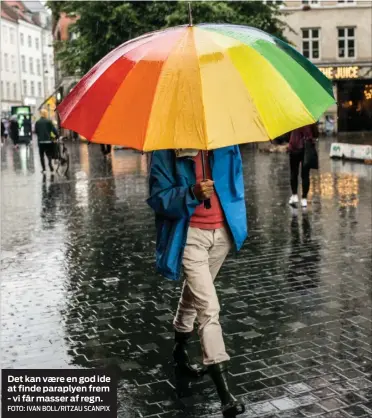  ?? FOTO: IVAN BOLL/RITZAU SCANPIX ?? Det kan vaere en god ide at finde paraplyen frem - vi får masser af regn.