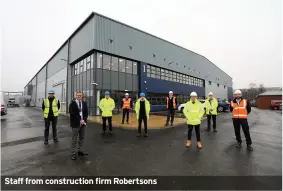  ??  ?? Staff from constructi­on firm Robertsons