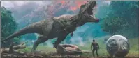  ?? The Associated Press ?? CHOICES: A scene from the upcoming "Jurassic World: Fallen Kingdom."