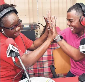  ??  ?? Broadcaste­r Nadine Blair and Garfene Grandison, public relations and digital manager at Nestlé Jamaica, having a moment of fun on World Mammograph­y Day, Friday, October 19.