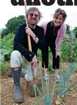  ??  ?? Digging it: Chas Hodges showing the Mail’s Jane Fryer his allotment in 2010