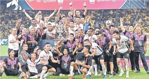  ??  ?? Pahang team celebrate after the FA Cup match between Pahang and Selangor at National Stadium Bukit Jalil. Pahang beat Selangor with 2-0. — Bernama photo