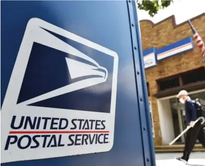  ?? MANDEL NGAN/AFP VIA GETTY IMAGES ?? A U.S. Postal Service mail box.