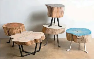  ?? CONTRIBUTE­D BY ALASAW.COM ?? Alabama Sawyer, a wood studio in Birmingham, has won awards and attention for its handsome dining and conference tables. But it also makes these whimsical Sputnik tables. Color, grain and size vary with species and finish. Expect organic knots and...