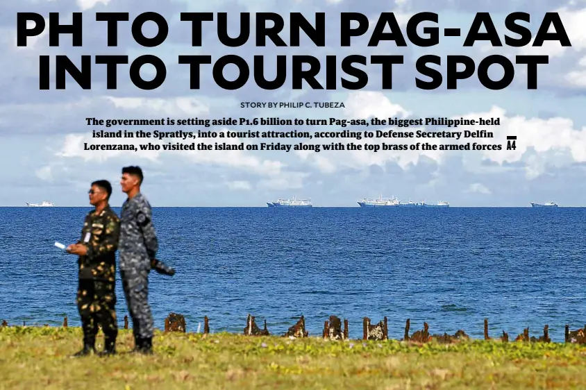  ?? —AP ?? Filipino soldiers stand on the edge of Pag-asa, the largest Philippine-held island in the Spratlys, ignoring a fleet of Chinese vessels looming on the horizon.