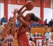  ?? PETE BANNAN — DIGITAL FIRST MEDIA ?? Upper Dublin’s Jackie Vargas puts a shot over Cardinal O’Hara’s Stephanie Huesby in the first quarter of their PIAA state playoff game at Archbishop Carroll Friday evening.