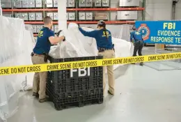  ?? FBI ?? Special agents with the evidence response team process material recovered from last week’s downing of a suspected Chinese spy balloon Thursday at the FBI laboratory in Quantico, Va.