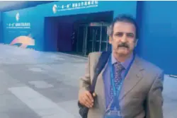  ??  ?? May 14, 2017: Ahmad Rashid Malik leaves the China National Convention Center in Beijing after the Thematic Session on Connectivi­ty of Think Tanks at the Belt and Road Forum for Internatio­nal Cooperatio­n. courtesy of Ahmad Rashid Malik