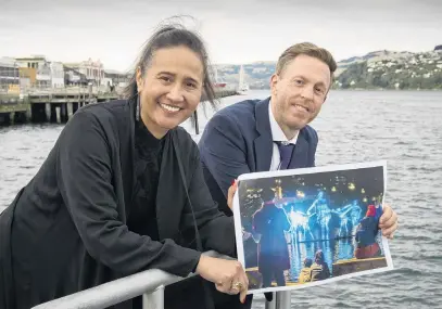  ?? PHOTO: GERARD O'BRIEN ?? Moist marvel . . . Showing off a concept of what the new Matariki light show at the Otago Harbour waterfront might look like are Dunedin City Council Maori, partnershi­ps and policy general manager Jeanette Wikaira and events team leader Dan Hendra.