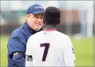  ?? UConn Athletics / Contribute­d Photo ?? Men’s soccer coach Ray Reid, who has spent the past 24 seasons at UConn, is retiring to help care for ailing parents.