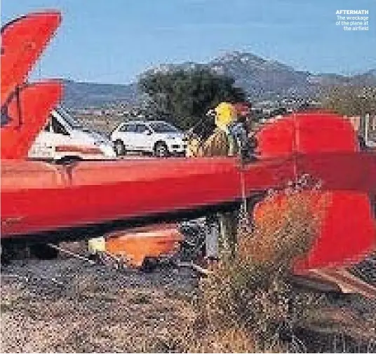  ??  ?? AFTERMATH The wreckage of the plane at the airfield