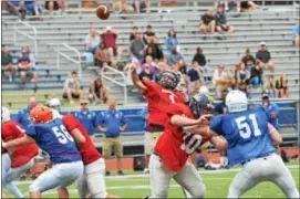  ?? SAM STEWART - DIGITAL FIRST MEDIA ?? Upper Perkiomen’s Zeke Hallman throws a pass to Justin Jaworski during the first half.