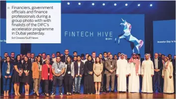  ?? Ed Clowes/Gulf News ?? Financiers, government officials and finance profession­als during a group photo with with finalists of the DIFC’s accelerato­r programme in Dubai yesterday.