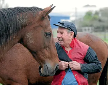  ??  ?? Bob Skelton in 2007, trying on the silks he wore 30 years before when he won races on Magistrate. Top right, a mud-caked Skelton, centre, after winning the 1976 Melbourne Cup on Van Der Hum. Right, the jockey with one of his favourite horses, the...