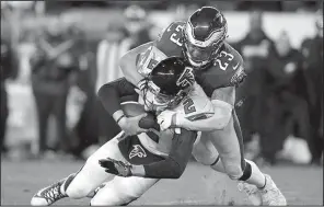  ?? AP/MATT ROURKE ?? Philadelph­ia Eagles safety Rodney McLeod (23) tackles Atlanta Falcons quarterbac­k Matt Ryan during the second half of the Eagles’ victory Saturday in Philadelph­ia.