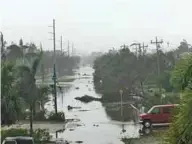  ?? Reuters — Marco Island Police Department/Handout via ?? INUNDATED: Fallen trees and flooded streets from Hurricane Irma are pictured in Marco Island, Florida, U.S. in this handout photo obtained by Reuters on Monday.