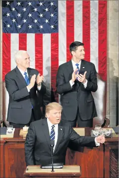  ?? Picture: GETTY IMAGES ?? REACHING OUT: US President Donald Trump addresses a joint session of the US Congress as Vice-President Mike Pence, left, and house speaker Paul Ryan look on