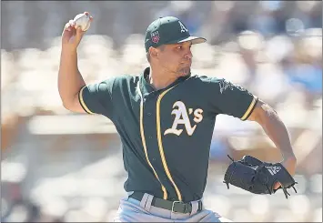  ?? BEN MARGOT — ASSOCIATED PRESS ?? Kendall Graveman, the A’s presumptiv­e Opening Day starter, worked two innings on Monday in his spring debut.