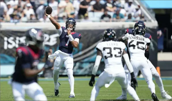  ?? John Raoux/Associated Press ?? Houston Texans quarterbac­k C.J. Stroud (7) passed for 280 yards, two touchdowns and averaged a sparkling 9.3 yards per attempt.