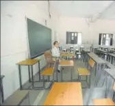  ?? HT P ?? A teacher conducts an online class in an empty classroom in Greater Noida on August 3.